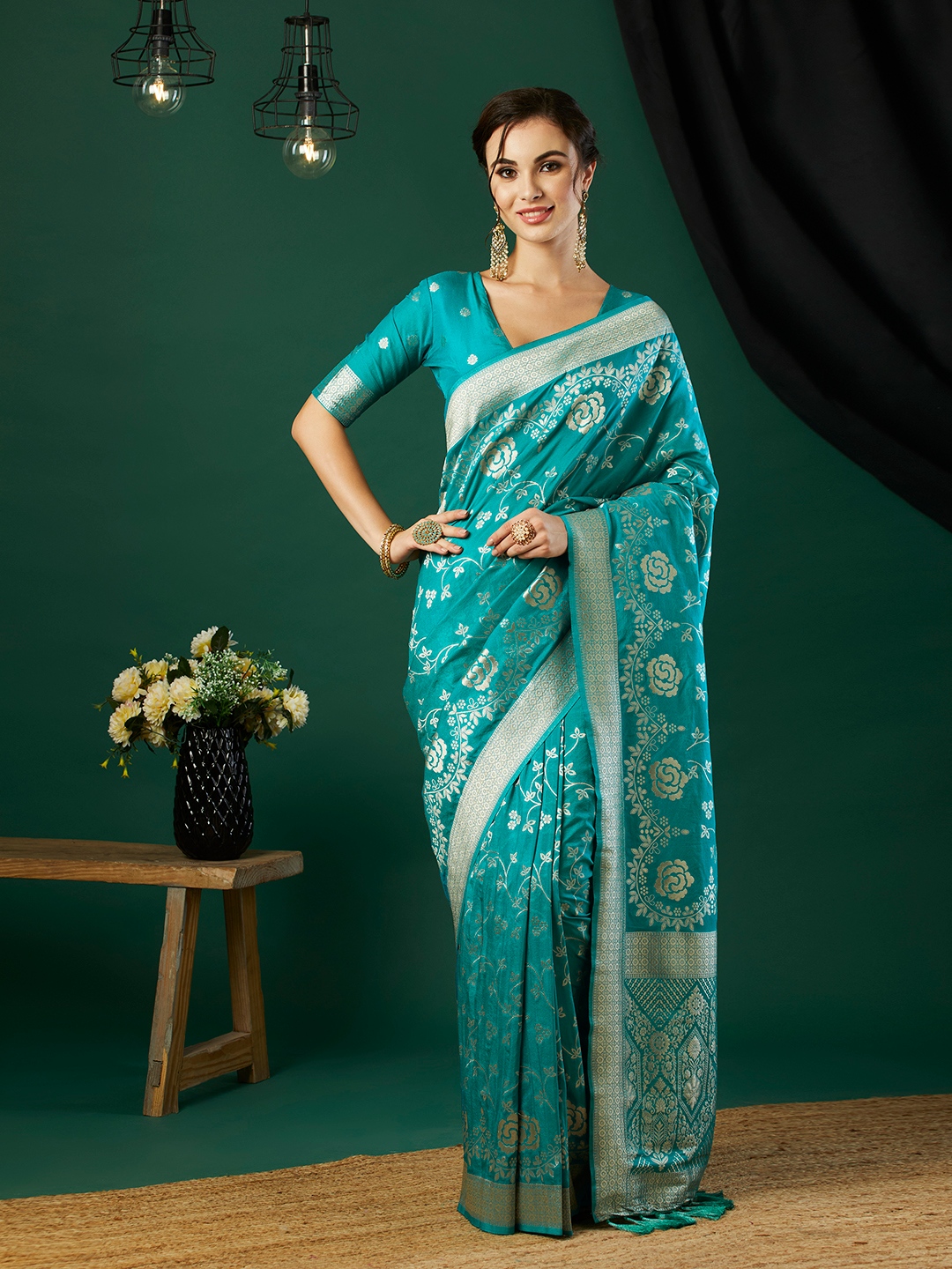 Aqua Blue Floral Jari Weaving Crepe Silk Saree
