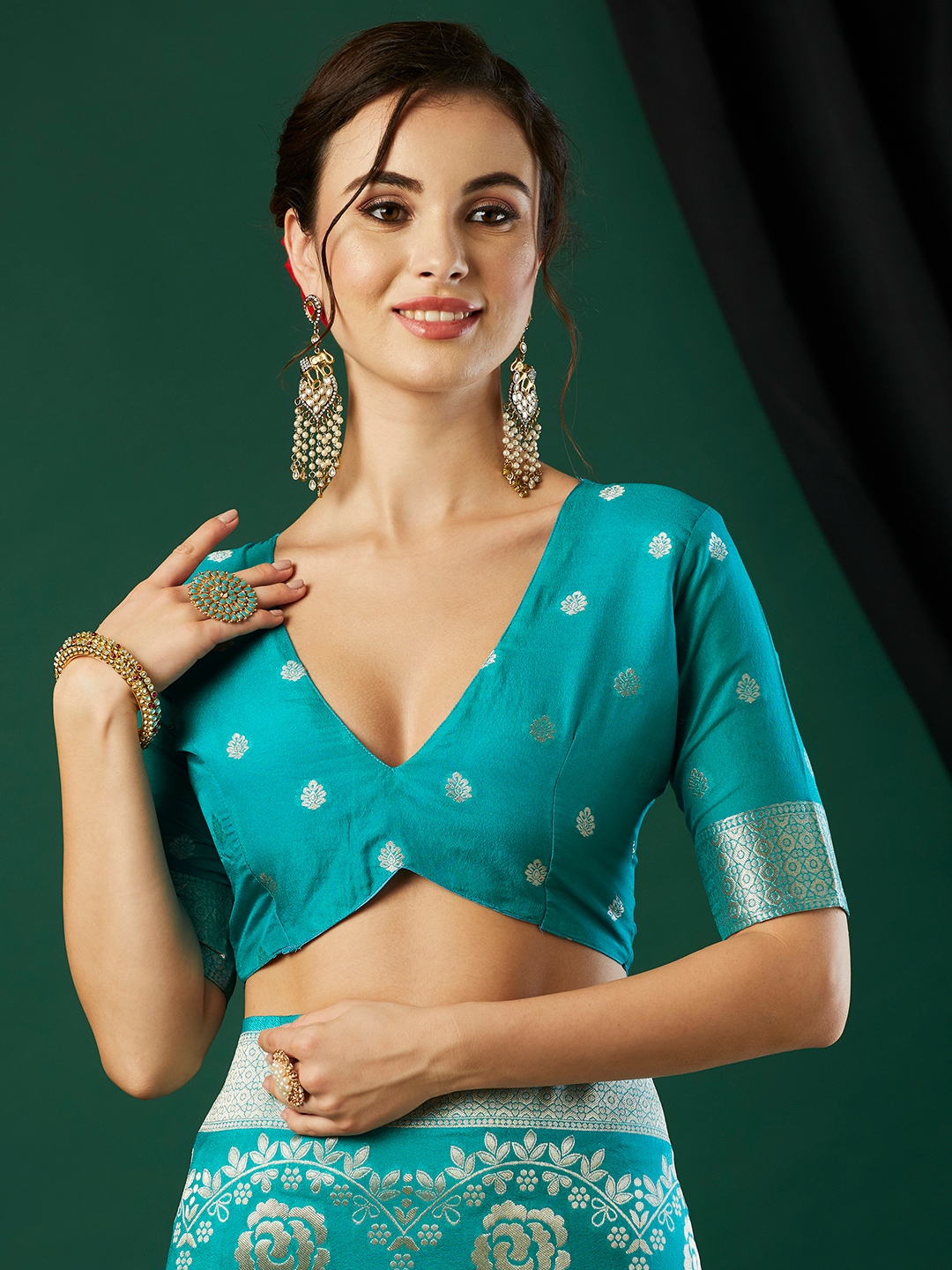 Aqua Blue Floral Jari Weaving Crepe Silk Saree