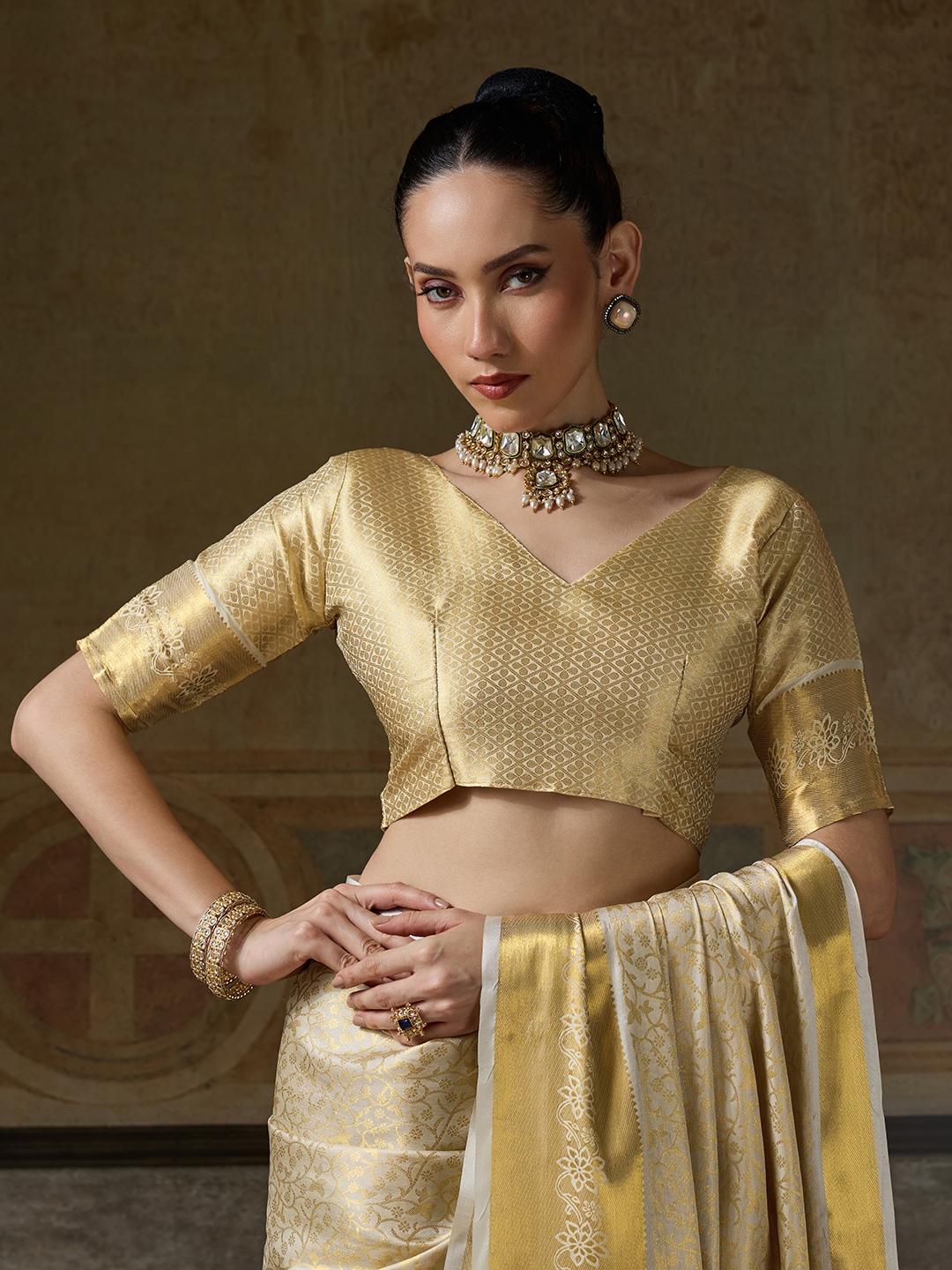 Beige Floral Woven Zari Kanchivaram Silk Saree