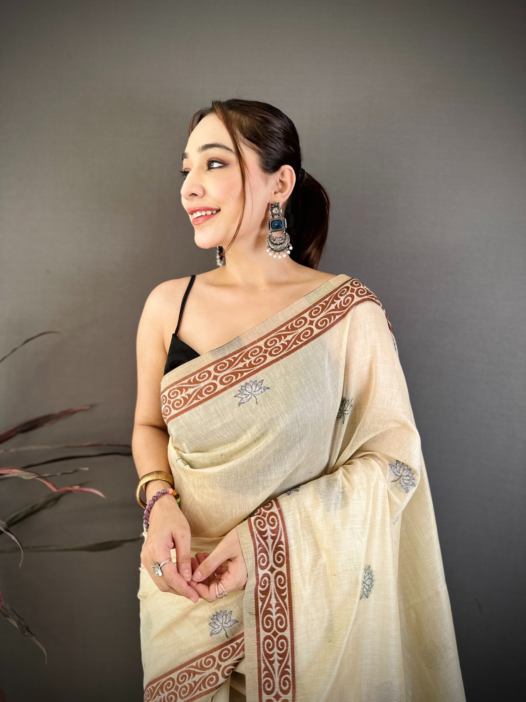 Cream Floral Weaving Muga Cotton Saree