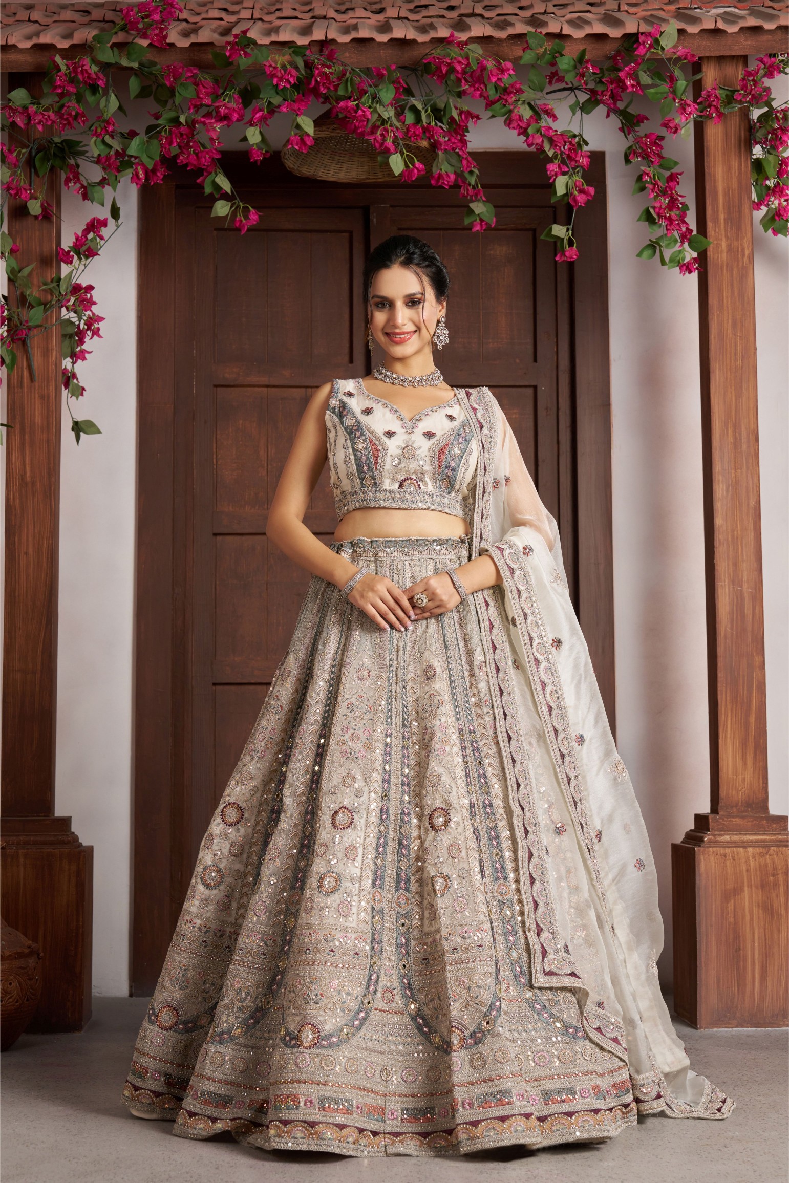 Cream Heritage Embroidery Net Panelled Lehenga Choli