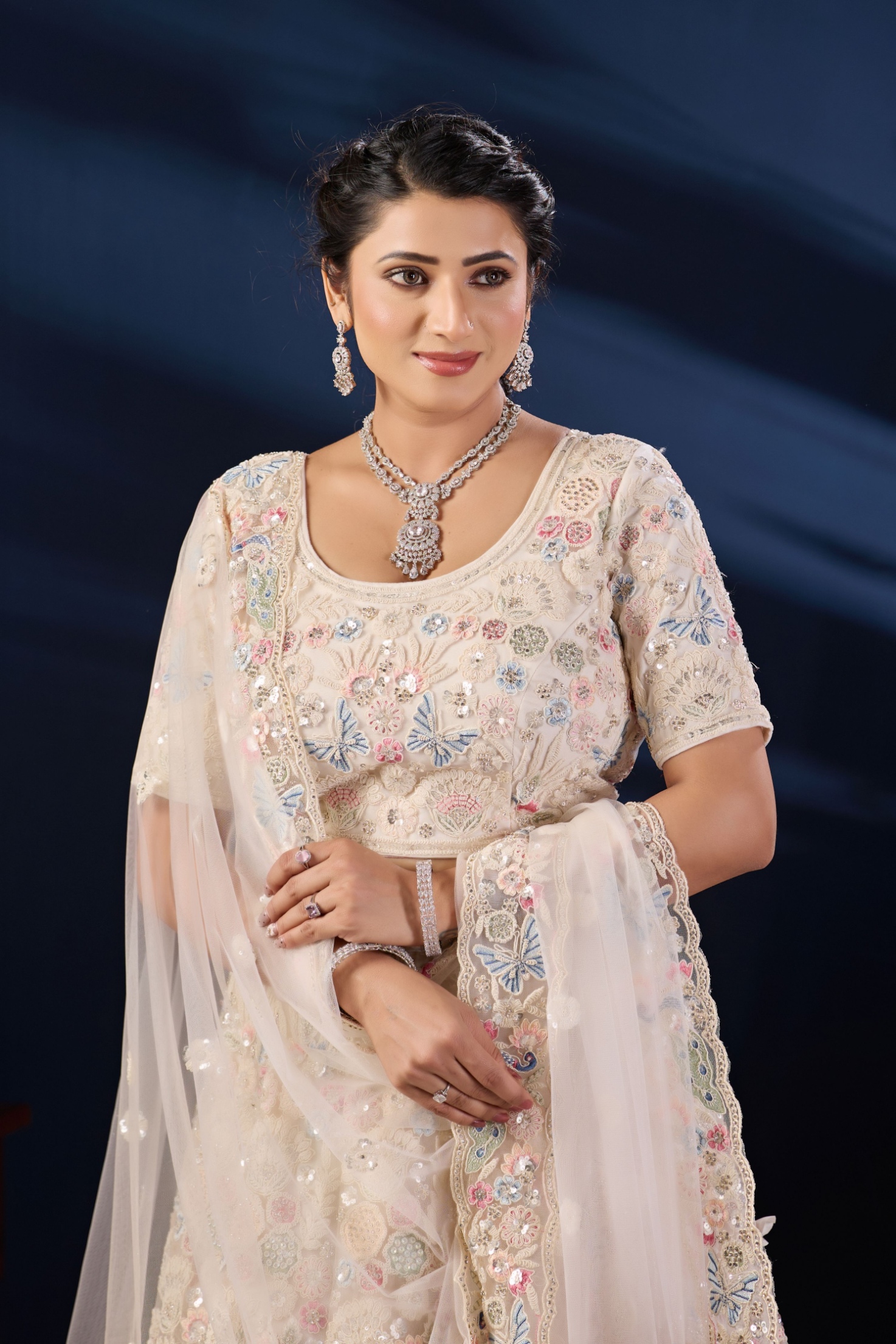 Ivory Cream Peacock Embroidered Net Lehenga Choli
