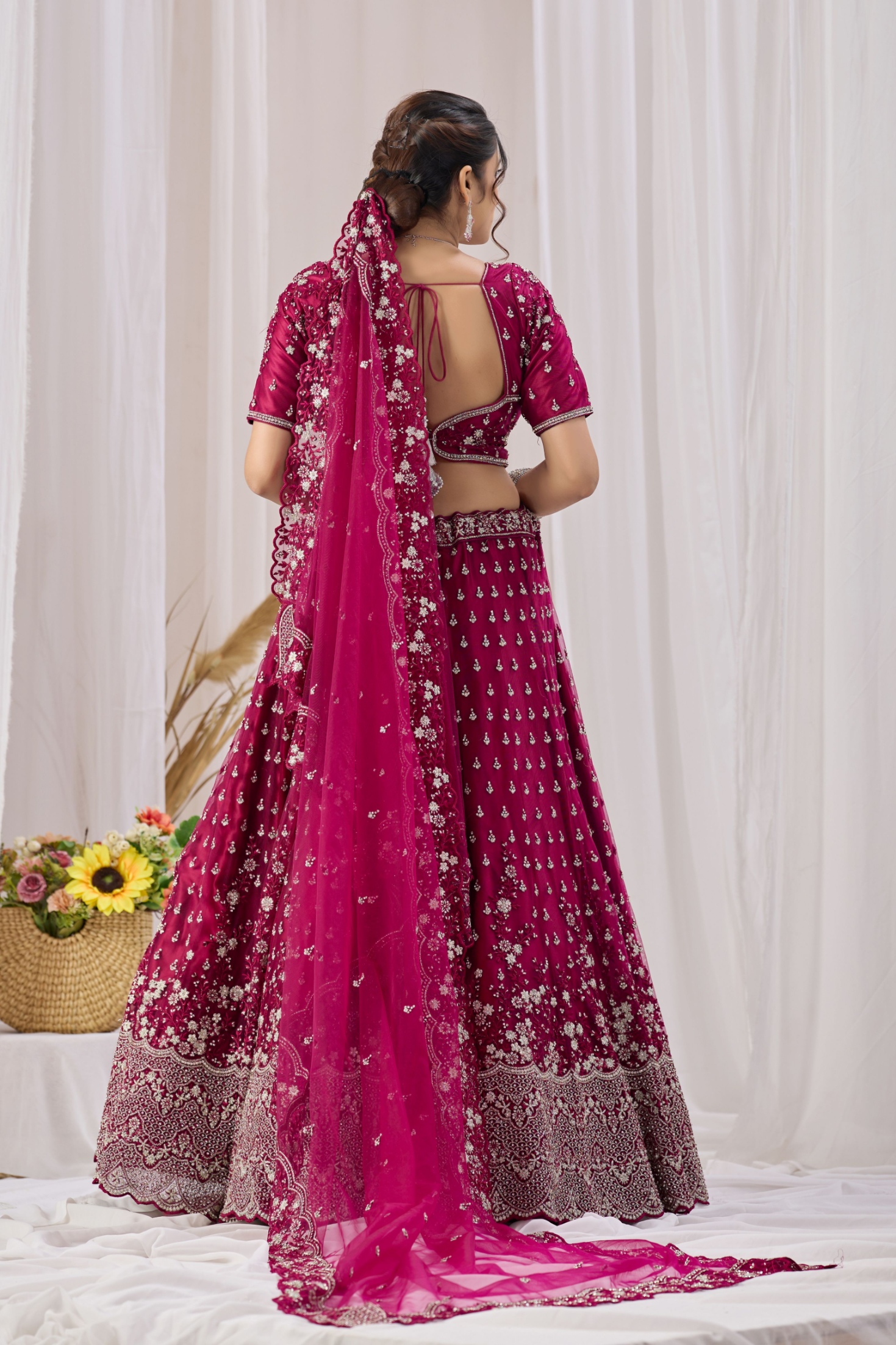 Magenta Ethnic Motif Embroidered Net Lehenga Choli — alternate view