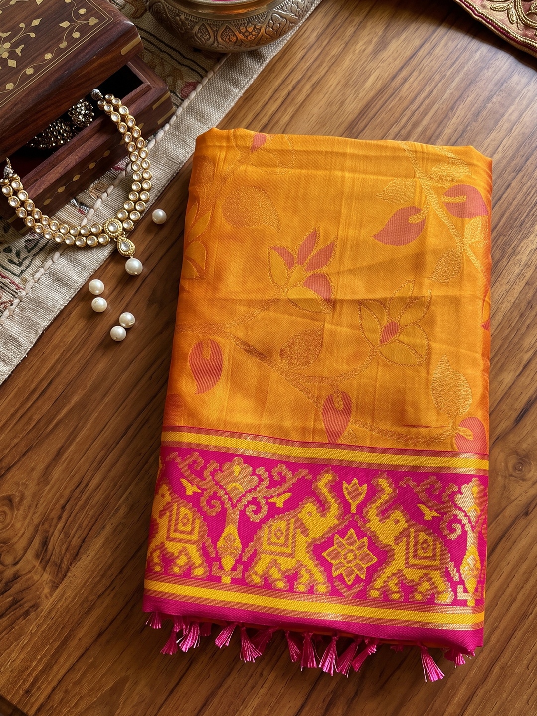 Orange Floral Woven Silk Saree