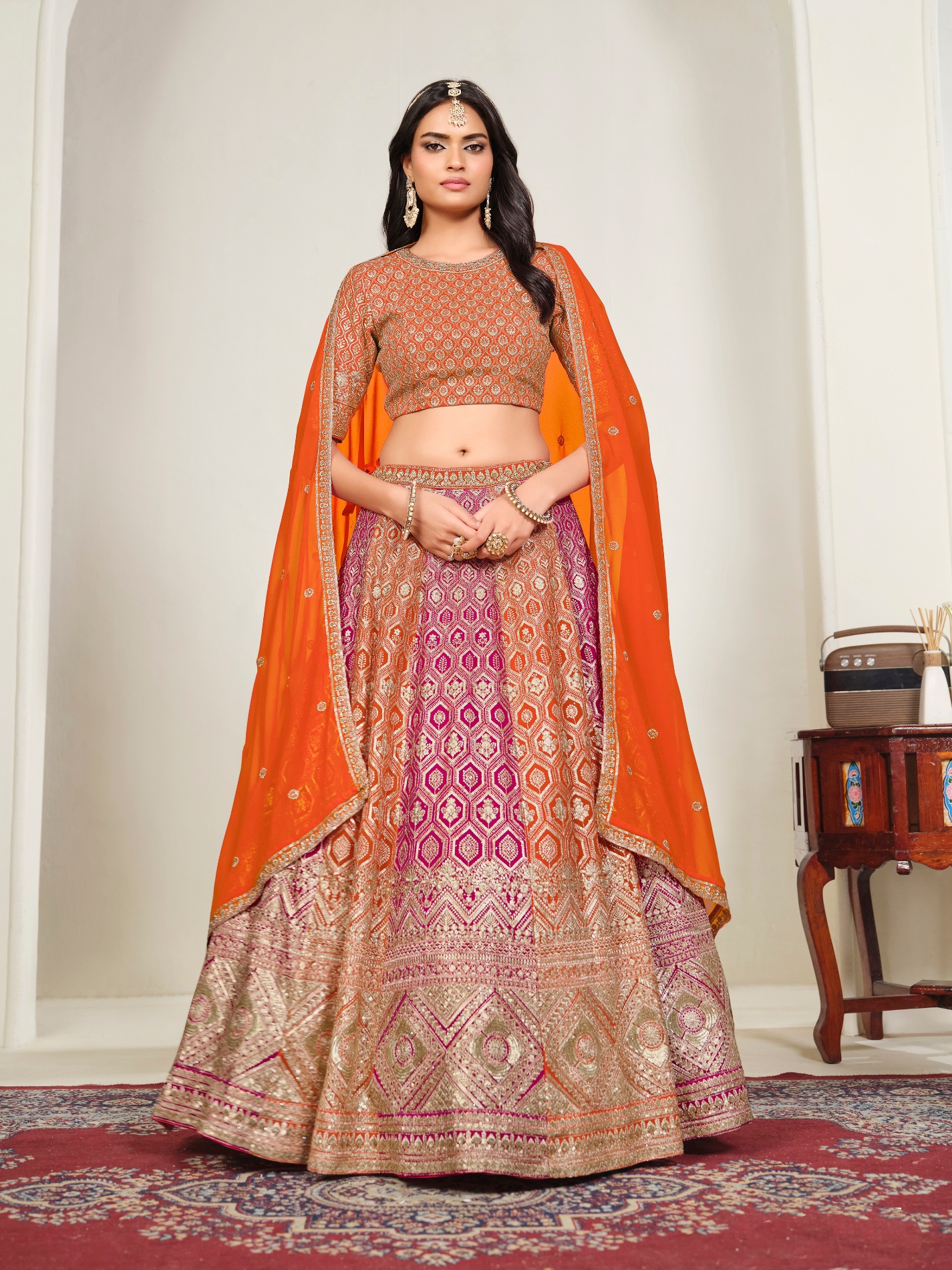 Orange Geometric Embroidered Faux Georgette Lehenga Choli