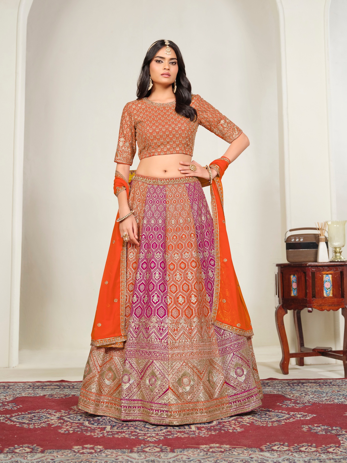 Orange Geometric Embroidered Faux Georgette Lehenga Choli