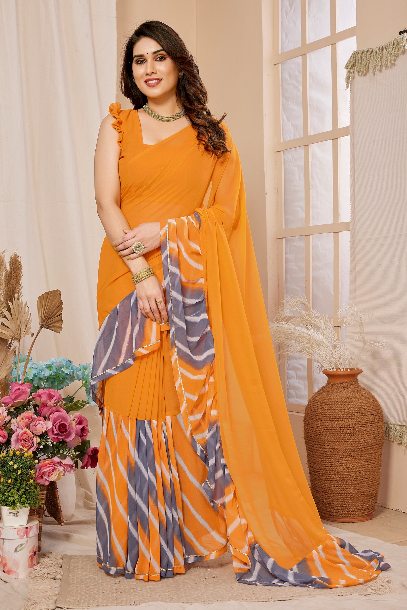 Orange Georgette Designer Ruffle Saree