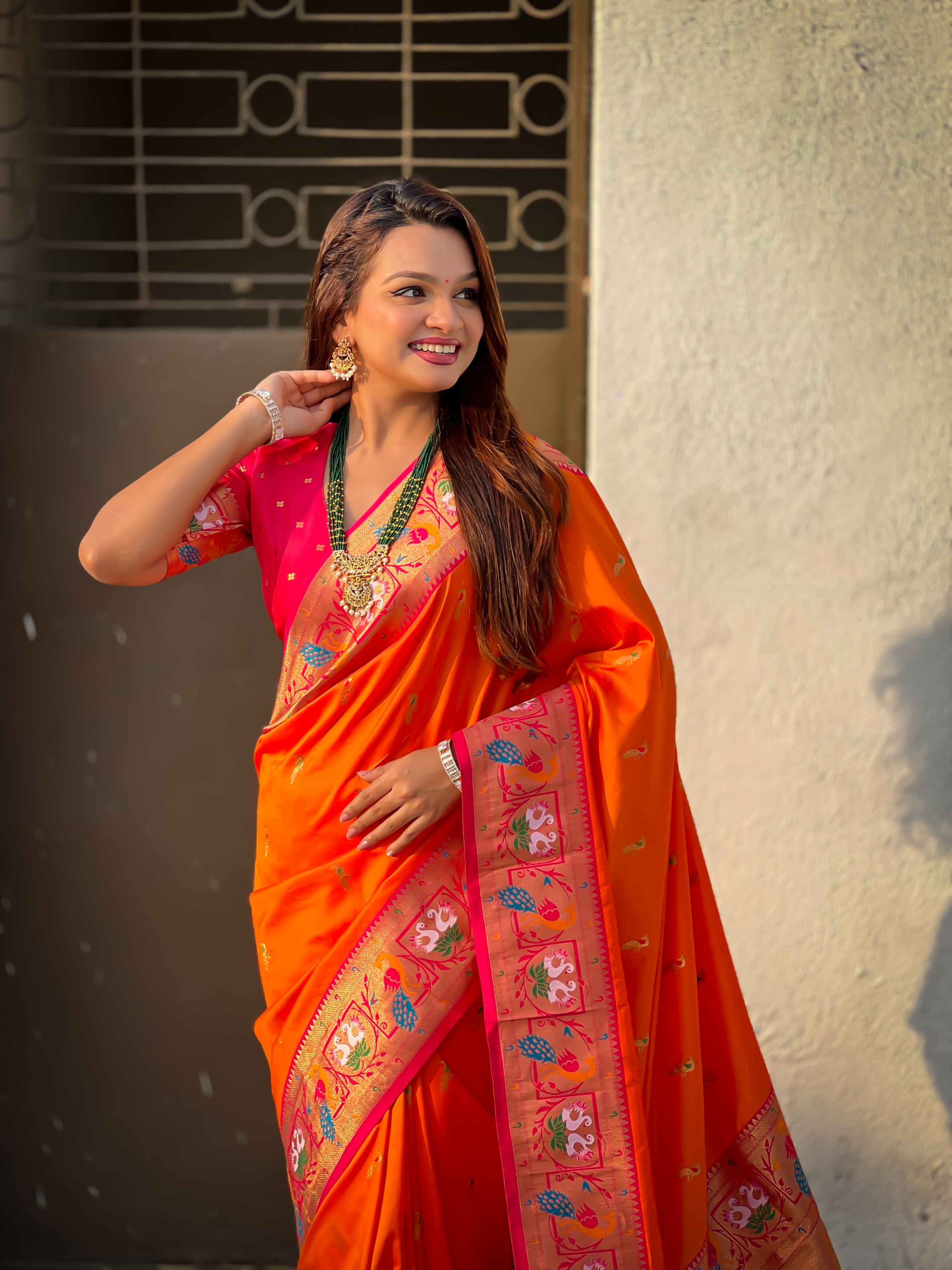 Orange Paithani Silk Saree with Pink Border
