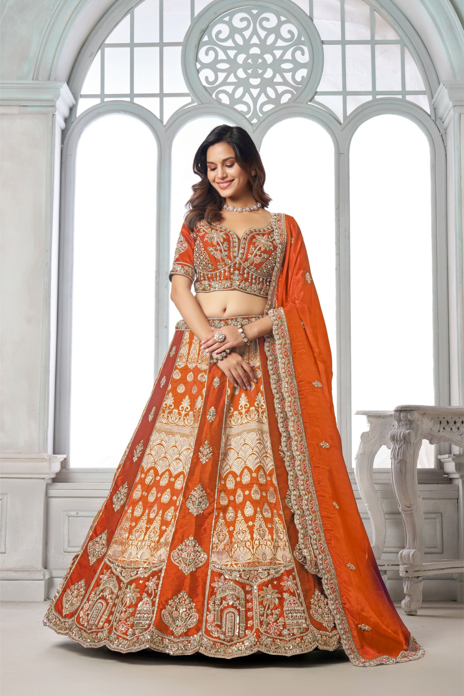 Orange Regal Embroidery Silk Panelled Lehenga Choli