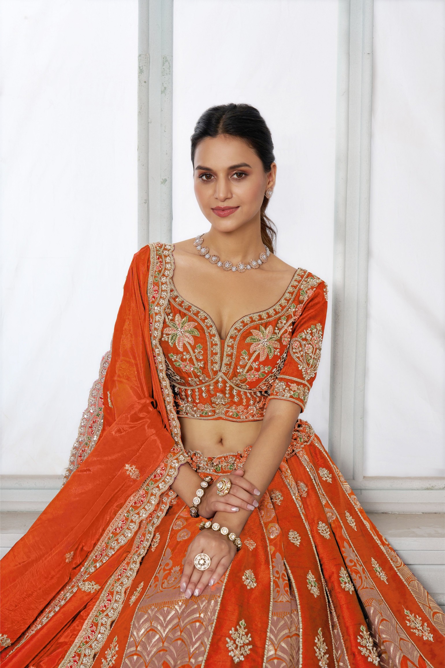Orange Regal Embroidery Silk Panelled Lehenga Choli