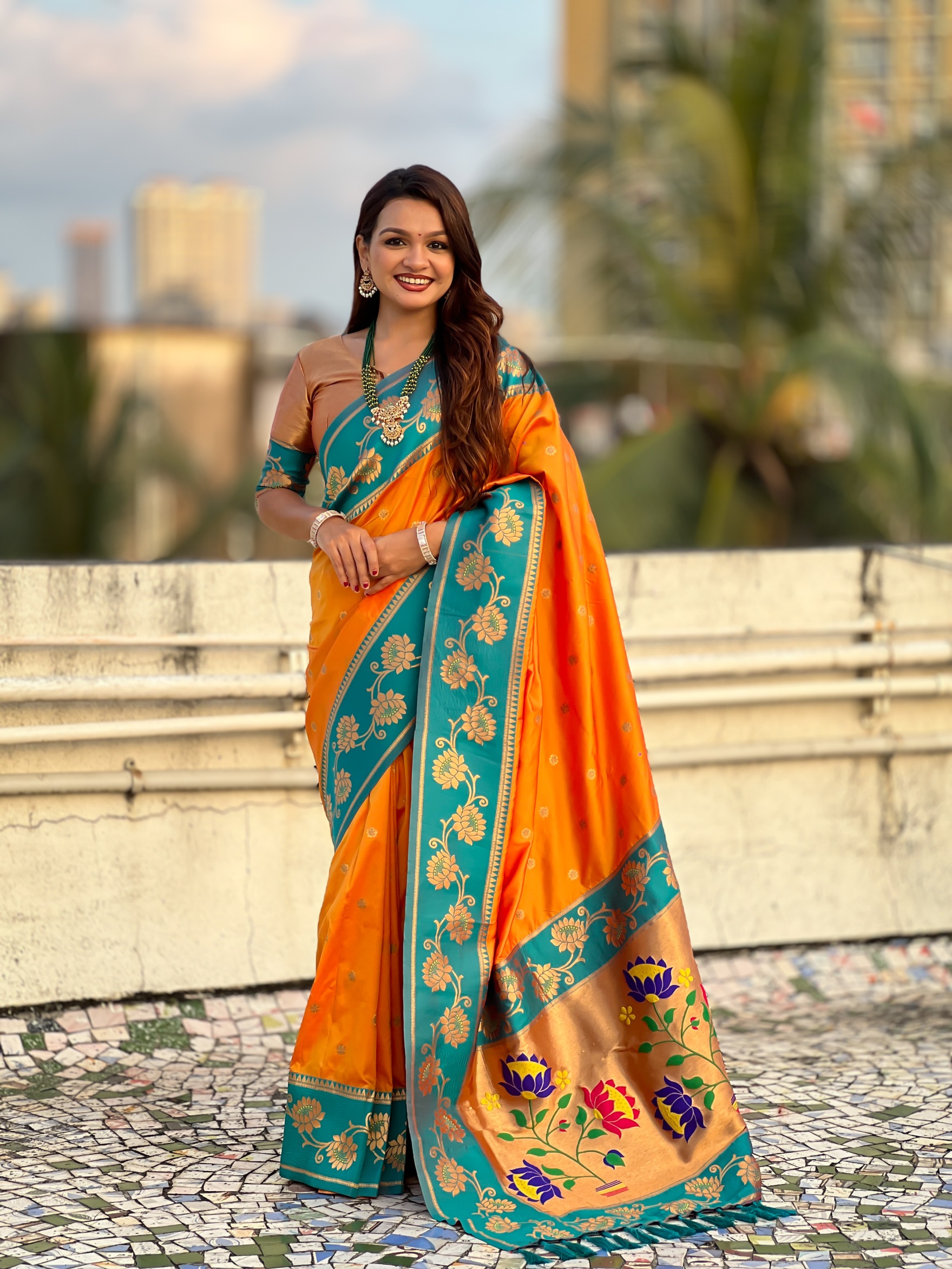 Orange Woven Lotus Meenakari Soft Silk Saree