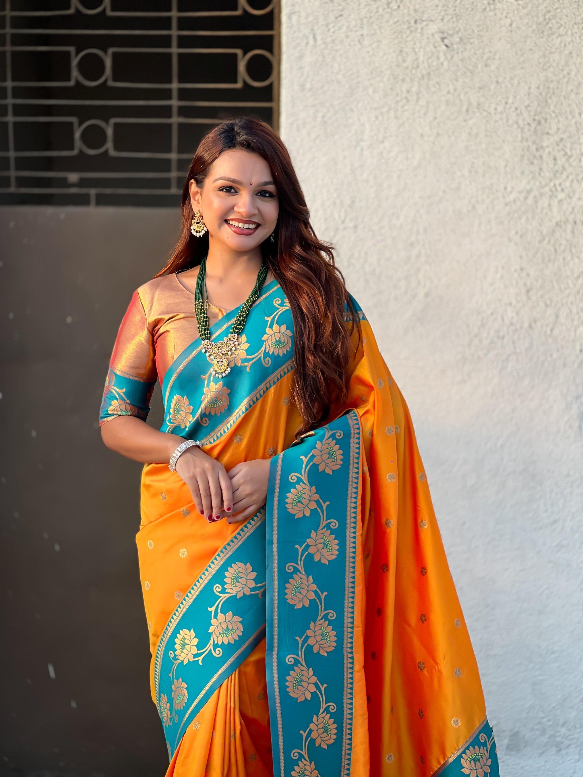 Orange Woven Lotus Meenakari Soft Silk Saree
