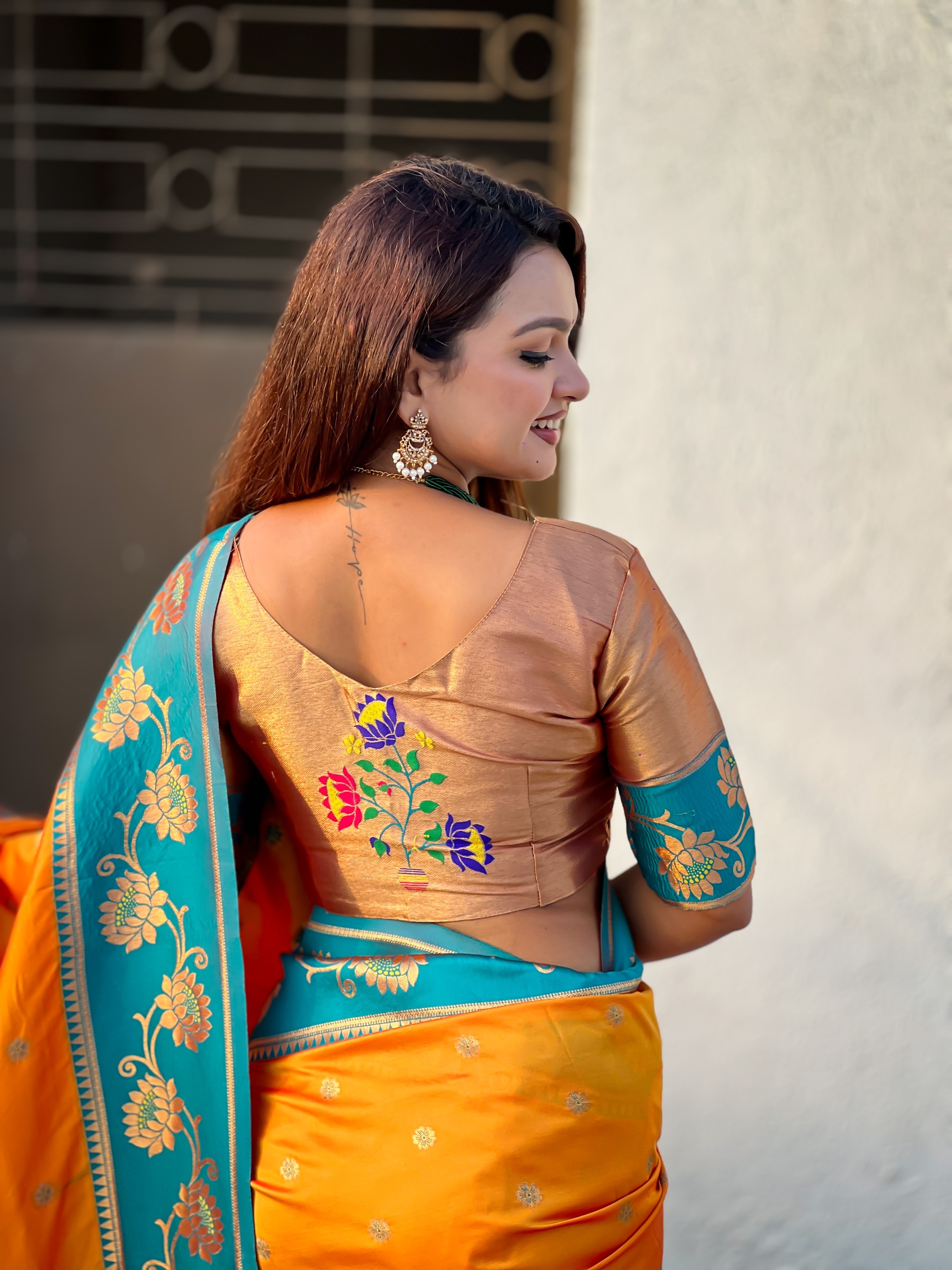 Orange Woven Lotus Meenakari Soft Silk Saree