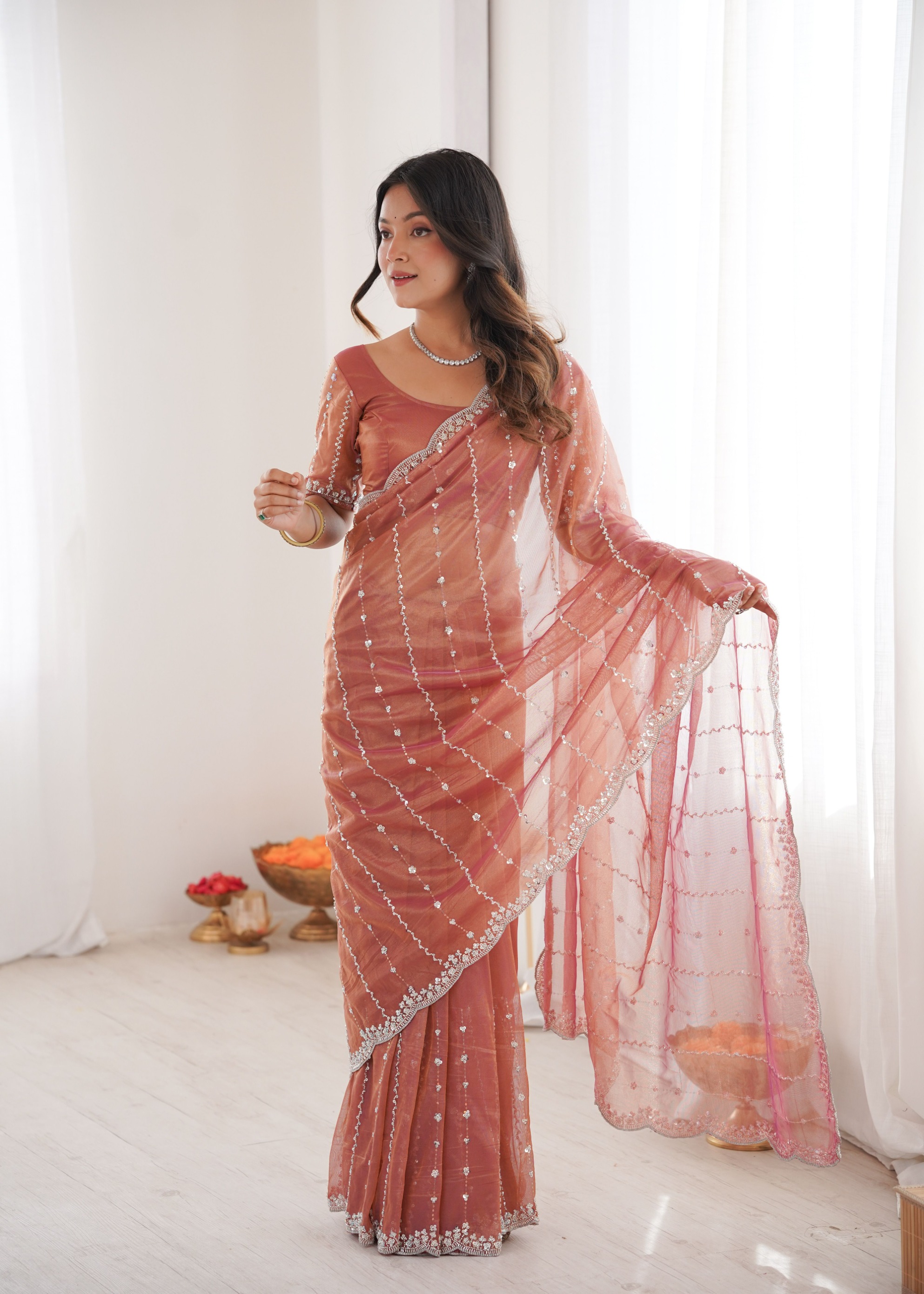 Peach Two Tone Sequin N Cut Dana Work Twill Net Saree