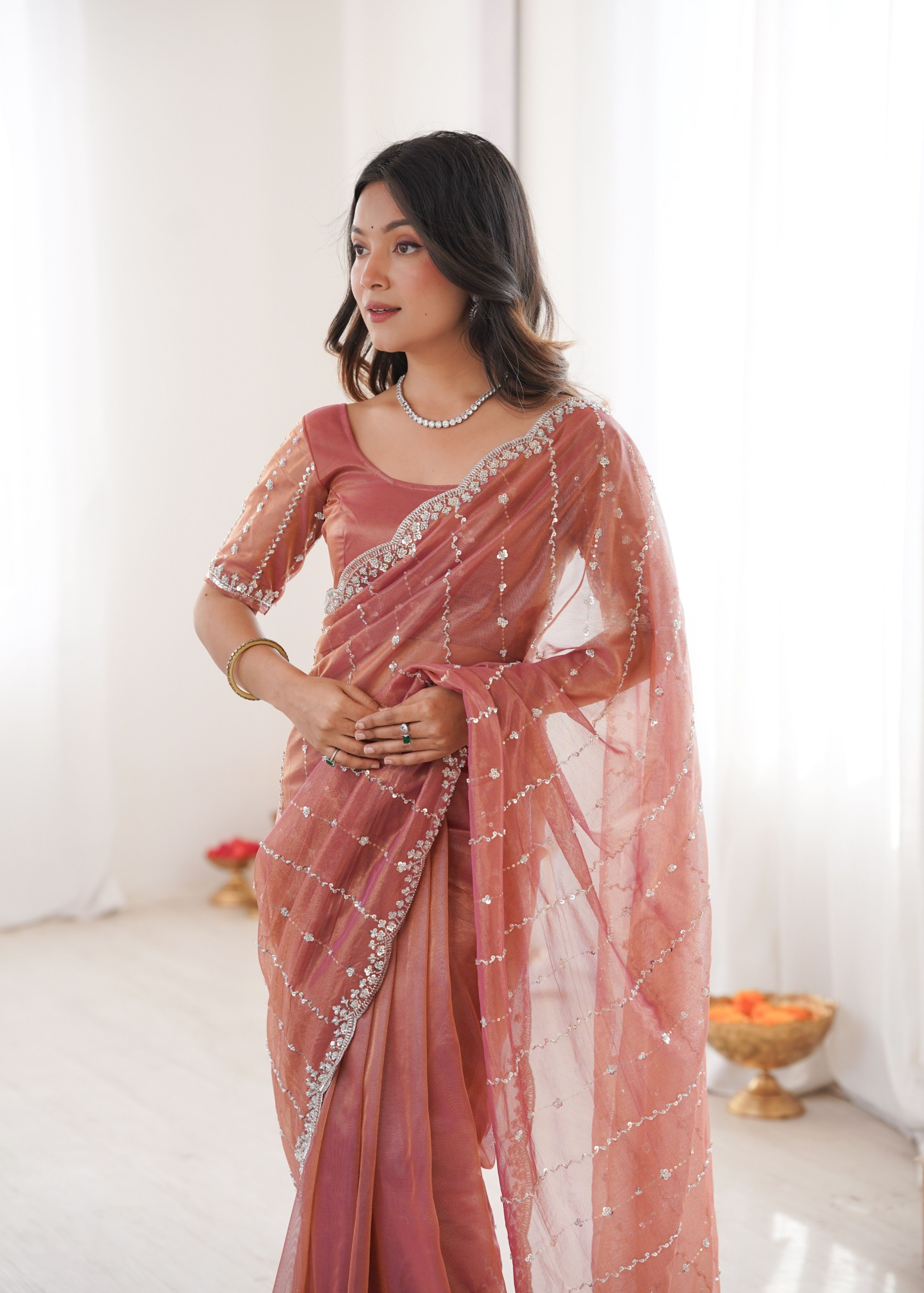 Peach Two Tone Sequin N Cut Dana Work Twill Net Saree