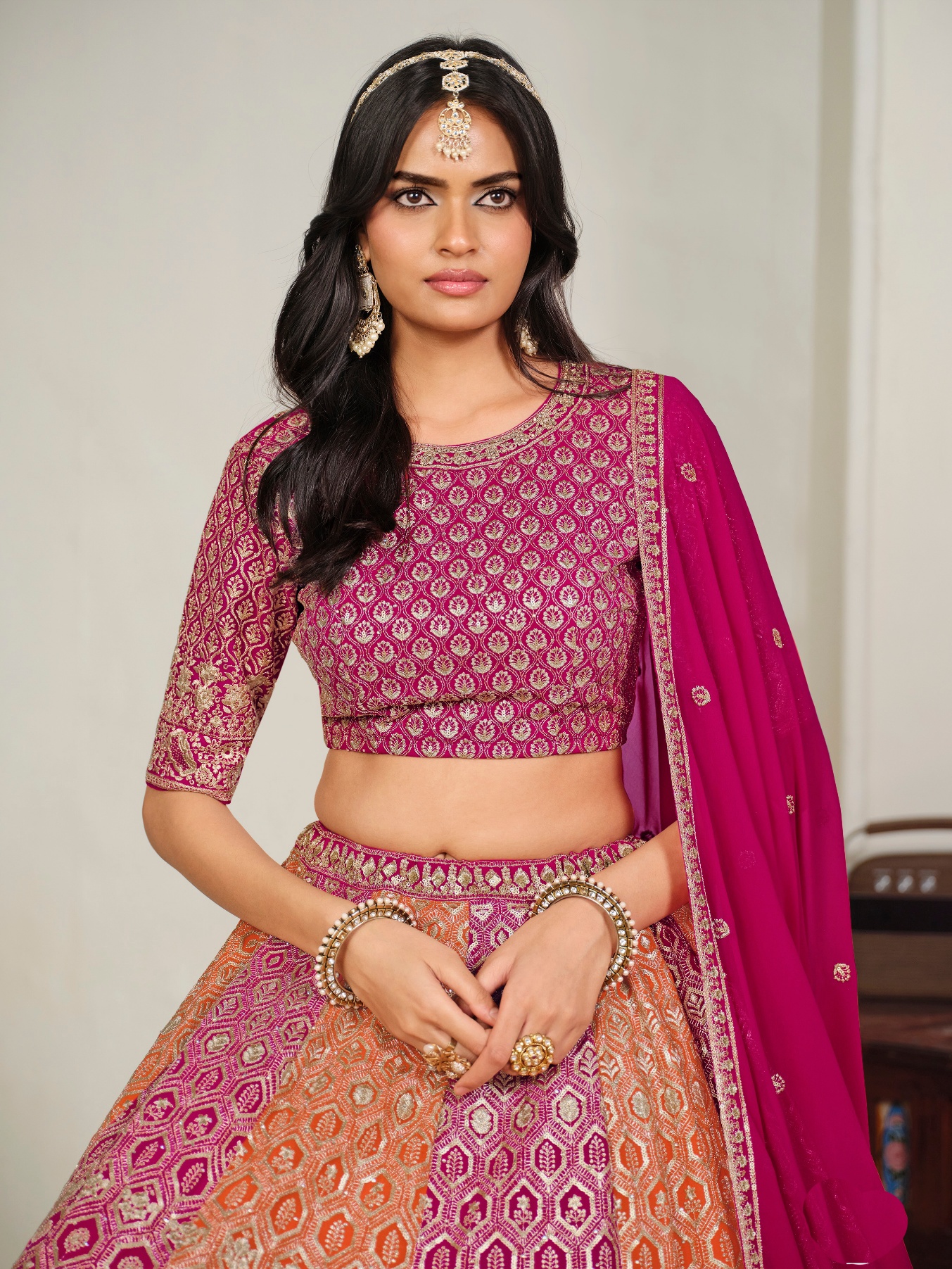 Pink Geometric Embroidered Faux Georgette Lehenga Choli