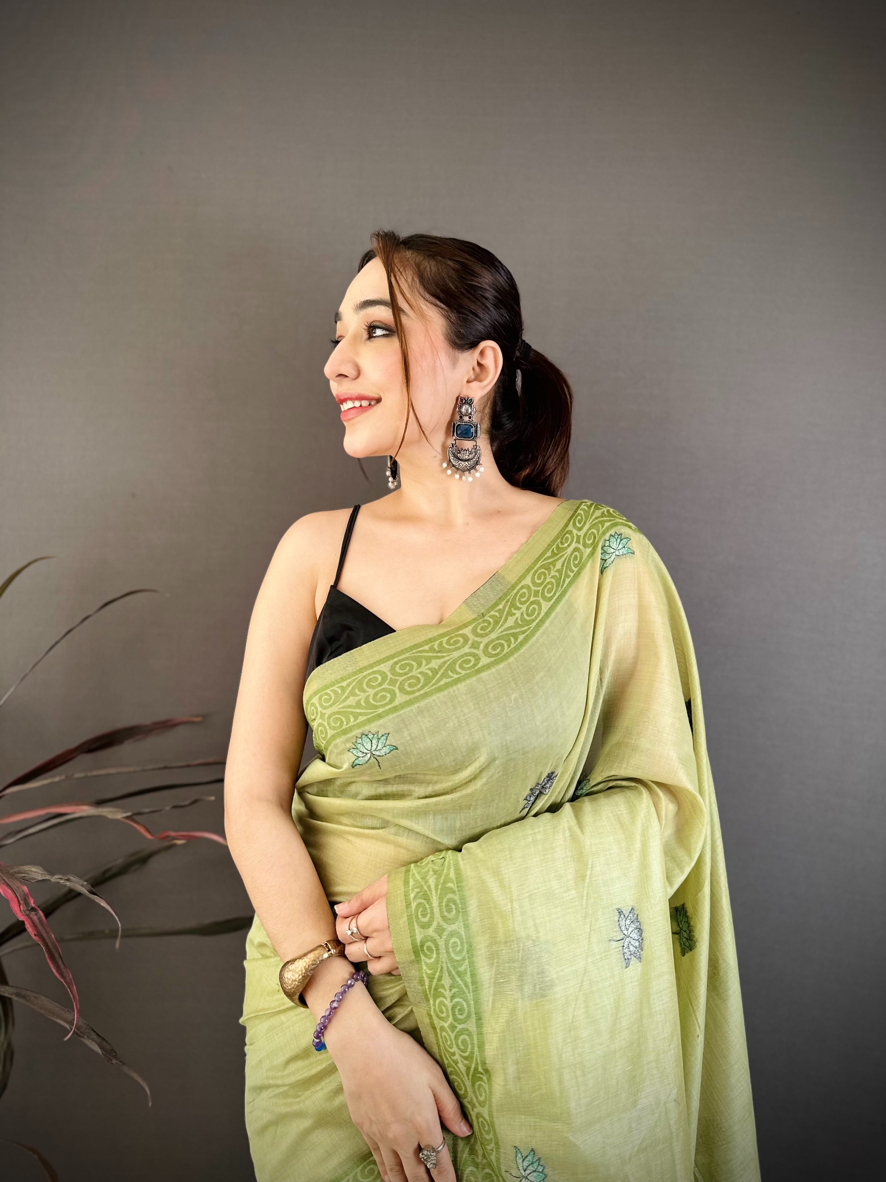 Pista Floral Weaving Muga Cotton Saree