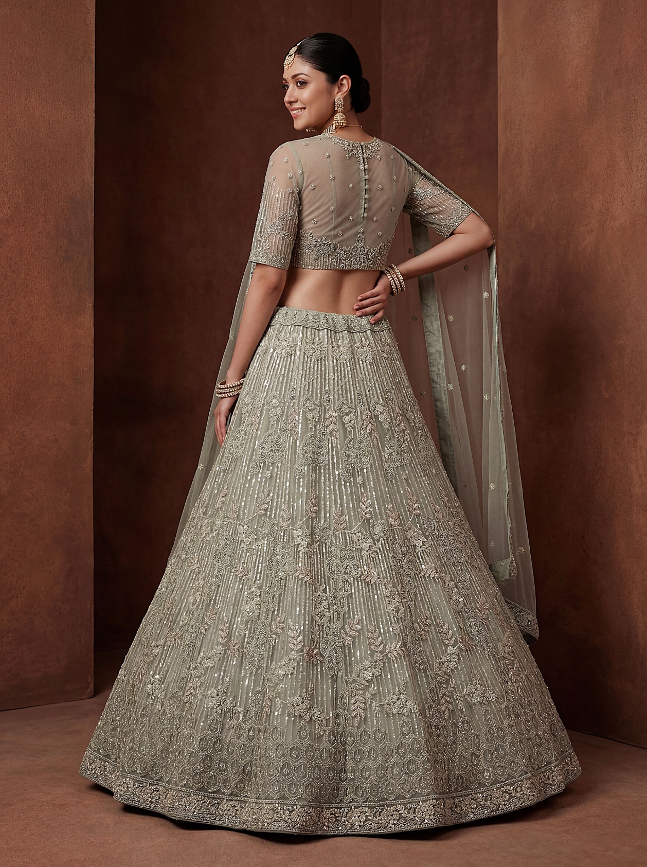 Pista Zircon Embroidered Net Lehenga Choli — alternate view