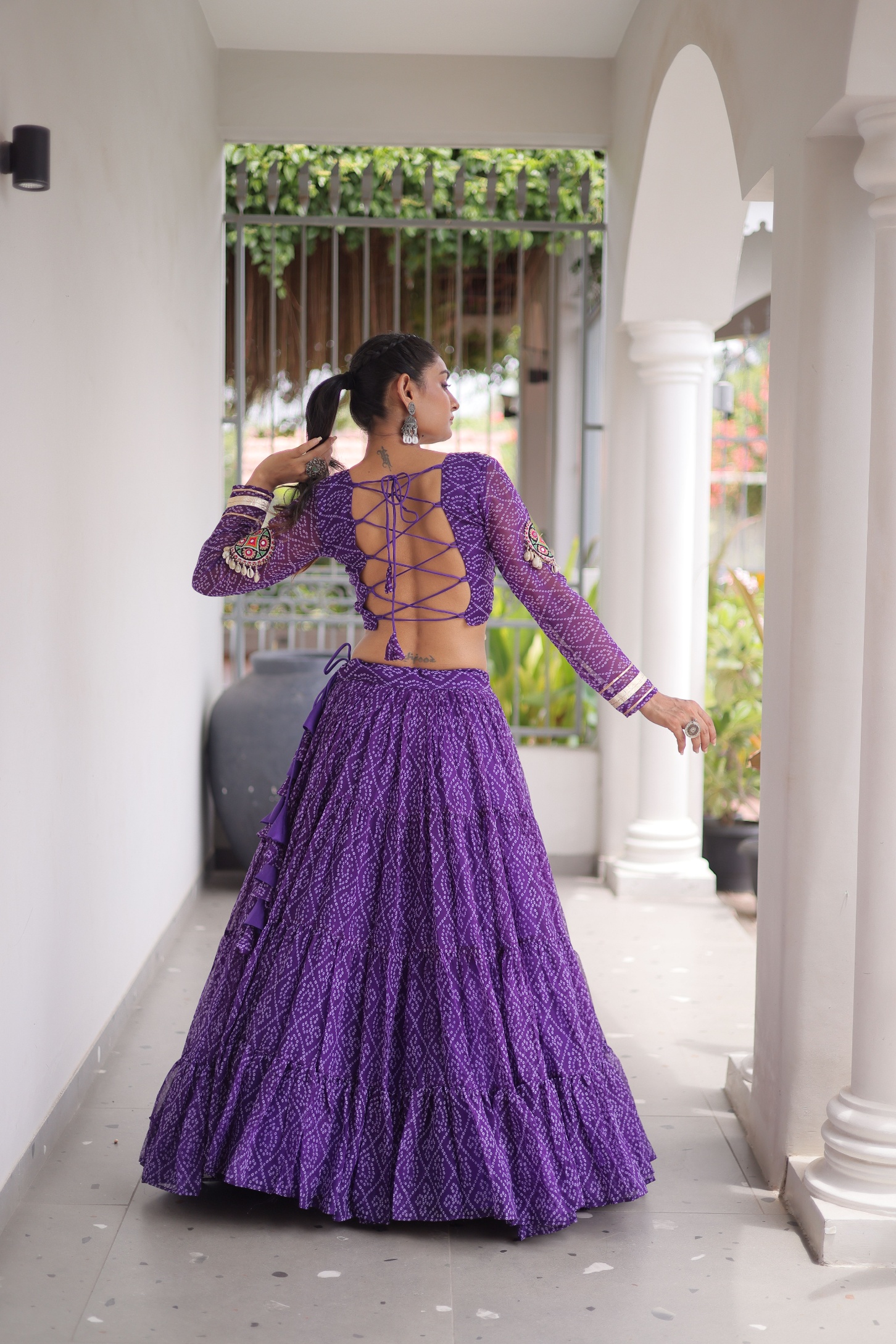Purple Bandhani Printed Faux Georgette Tiered Lehenga — alternate view