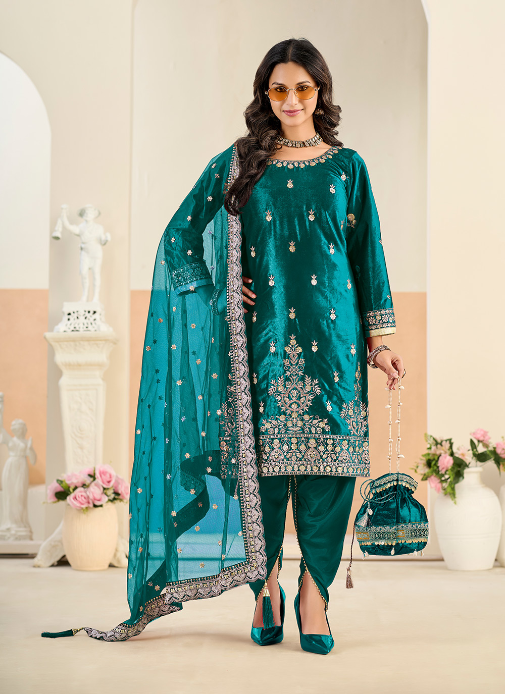 Rama Embroidered Velvet Salwar Suit