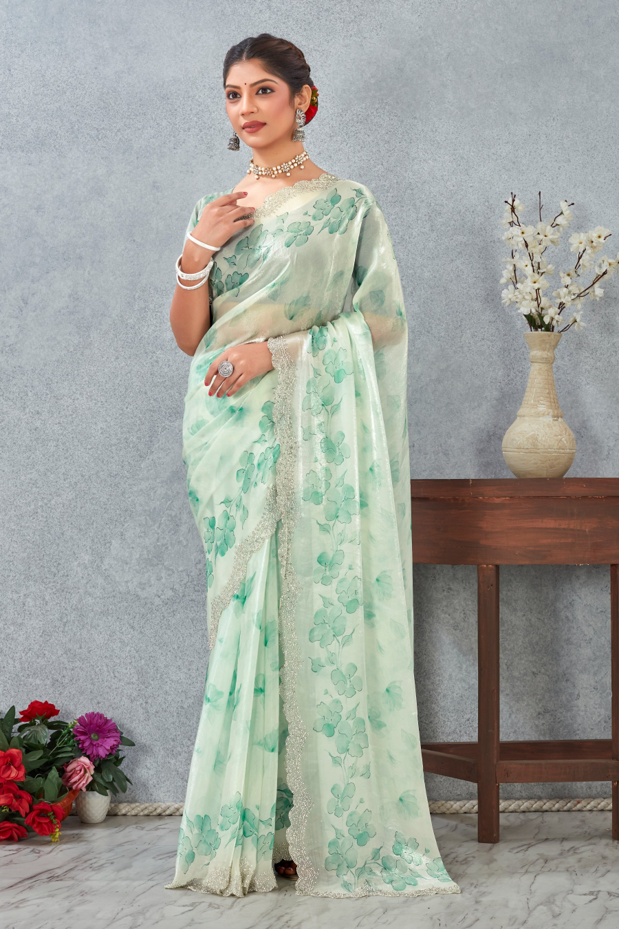 Rama Green Fendy Satin Floral Zircon Border Saree