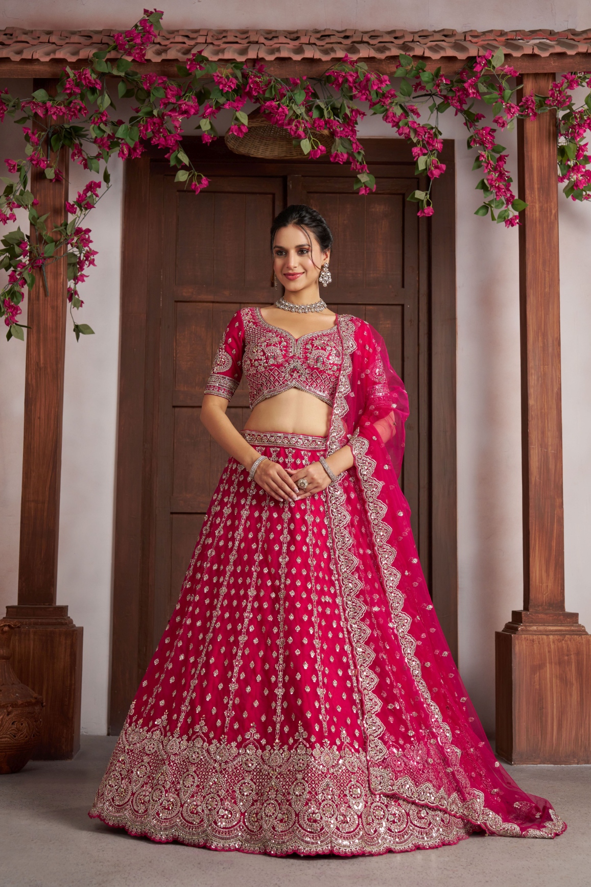 Rani Pink Net Embroidered Bridal Lehenga Choli