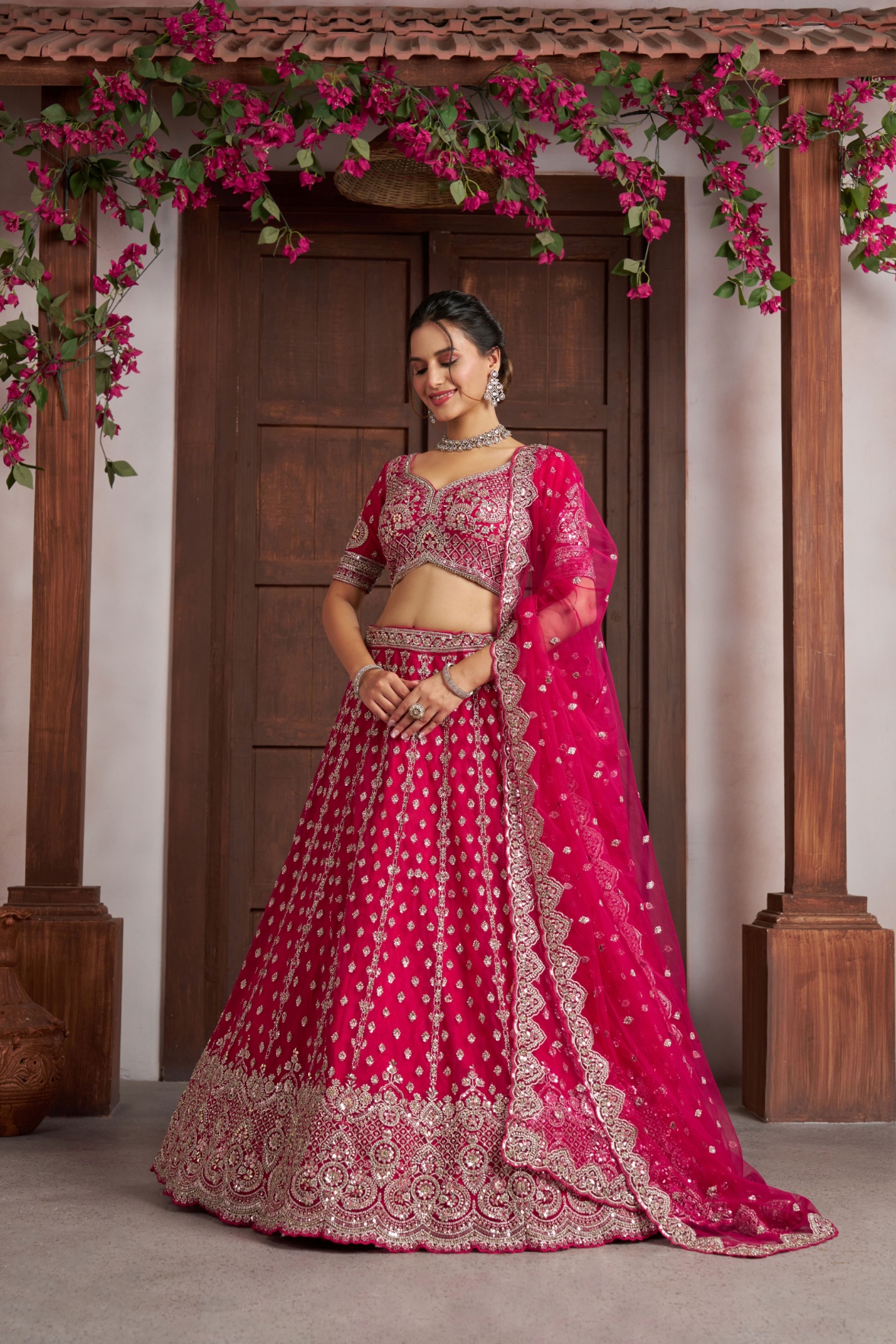 Rani Pink Net Embroidered Bridal Lehenga Choli