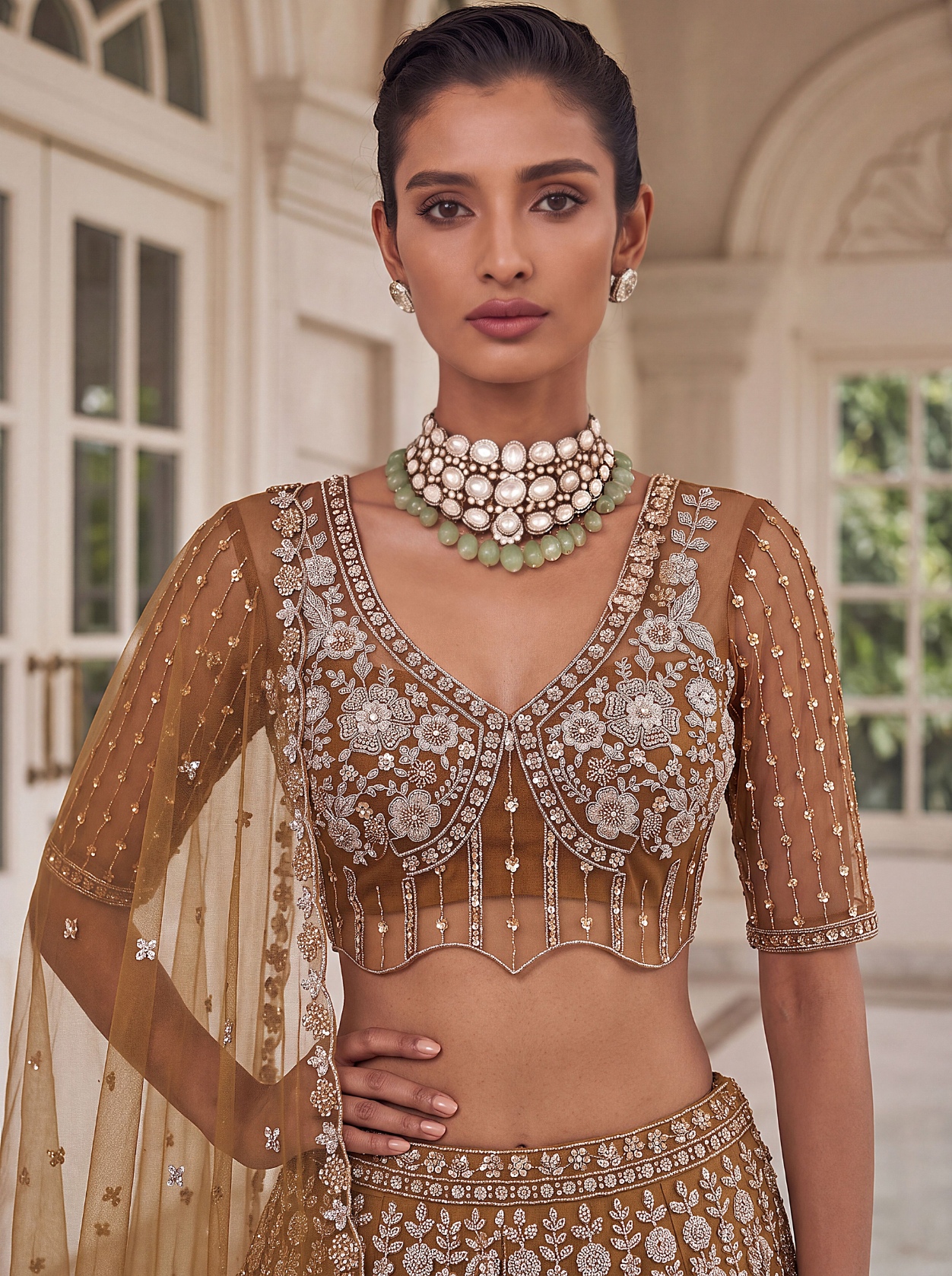 Rust Floral Embroidered Net Lehenga Choli