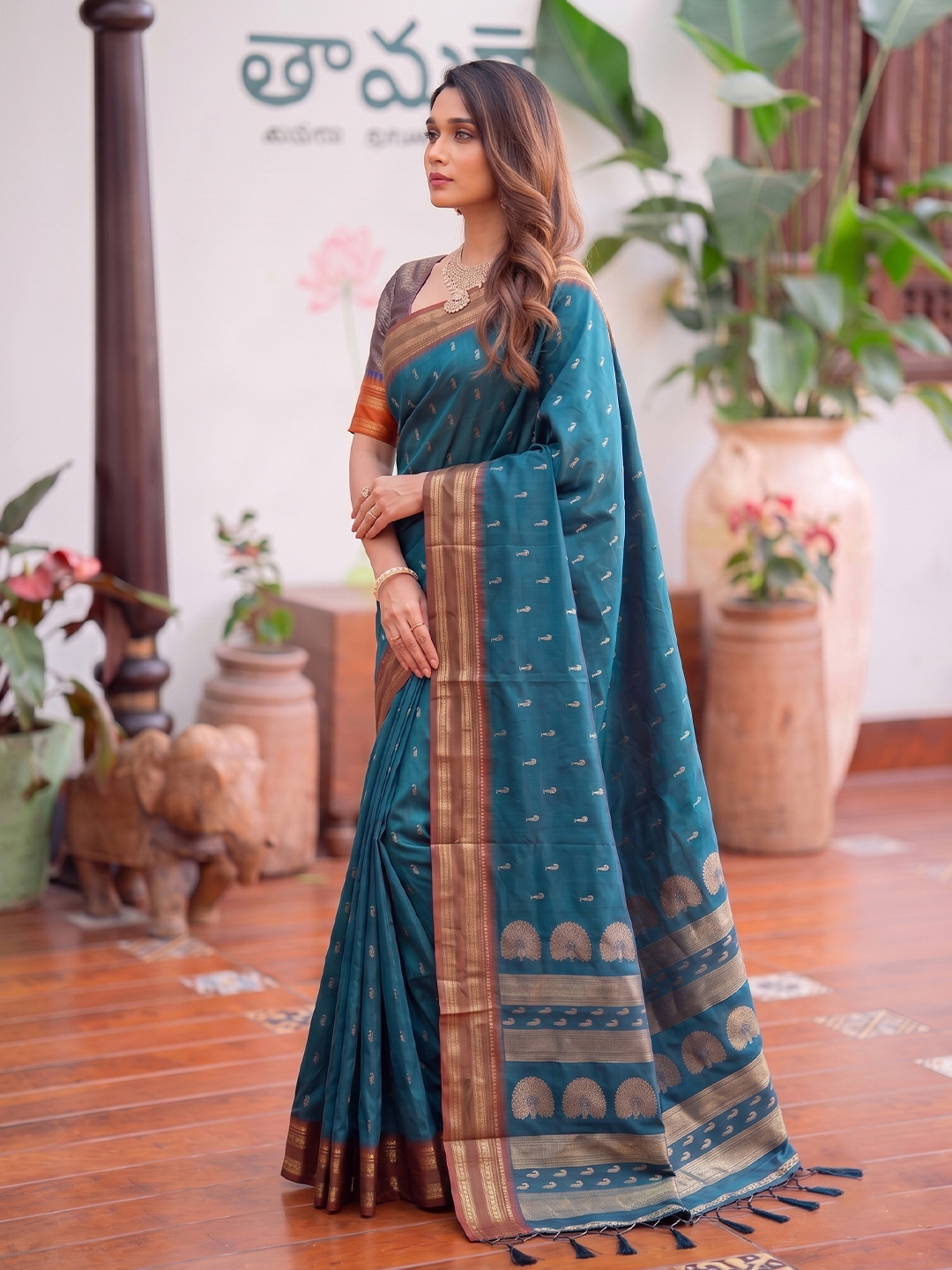 Teal Blue Paisley Woven Soft Silk Saree