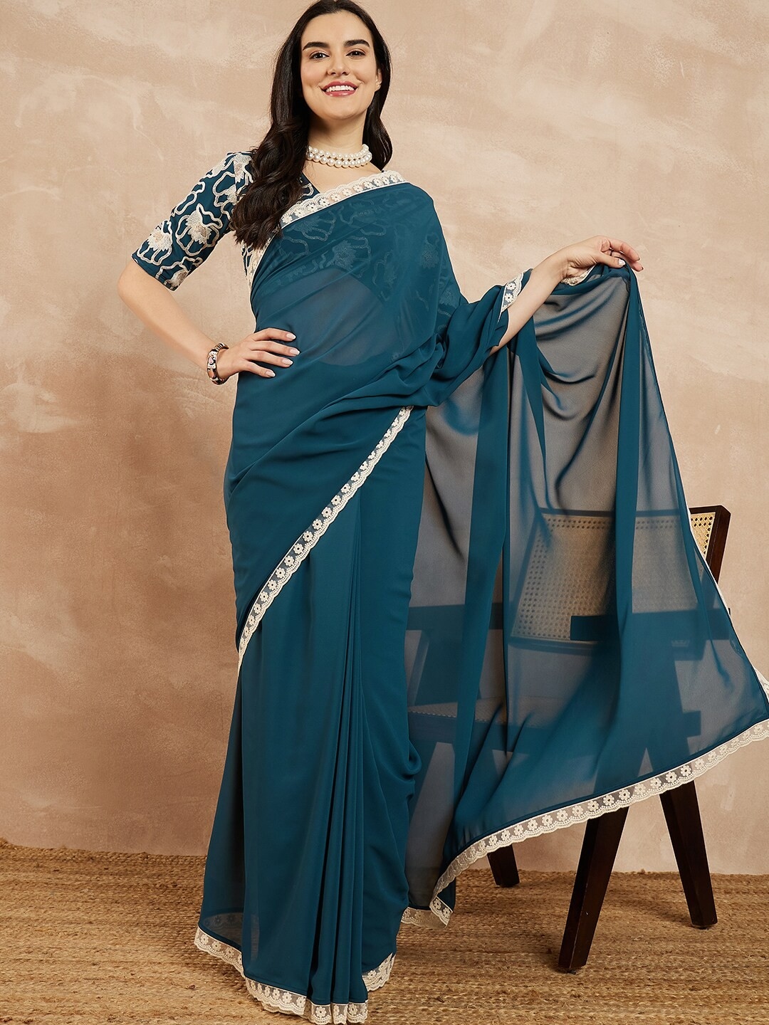 Teal Floral Embroidered Georgette Saree