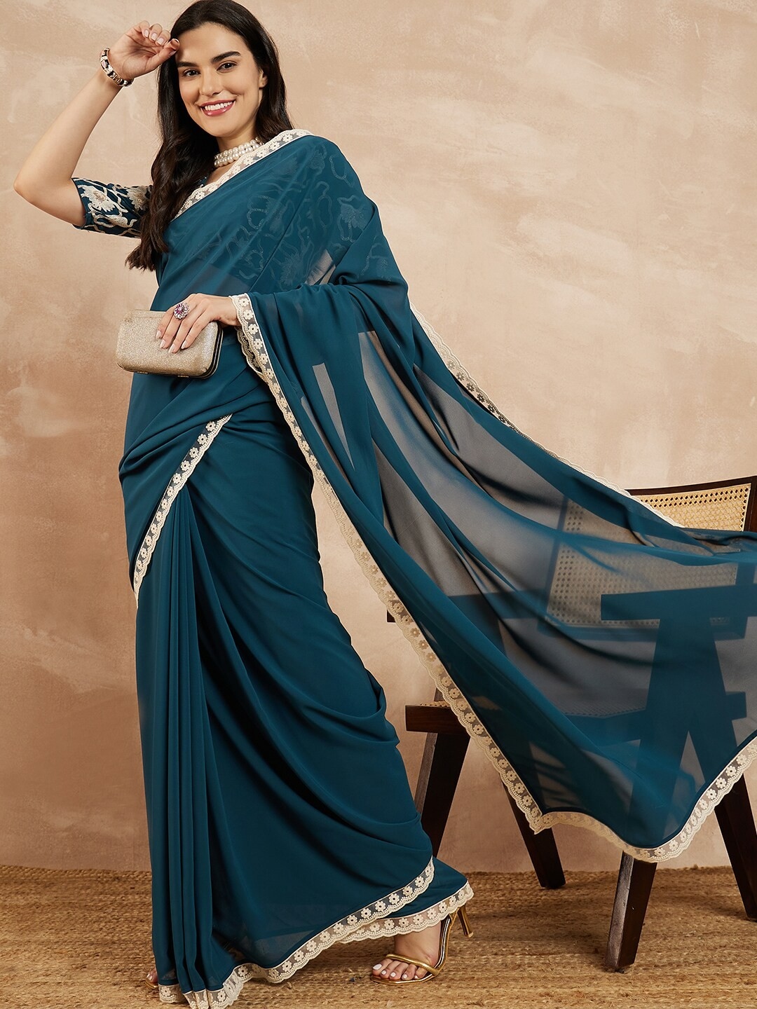 Teal Floral Embroidered Georgette Saree