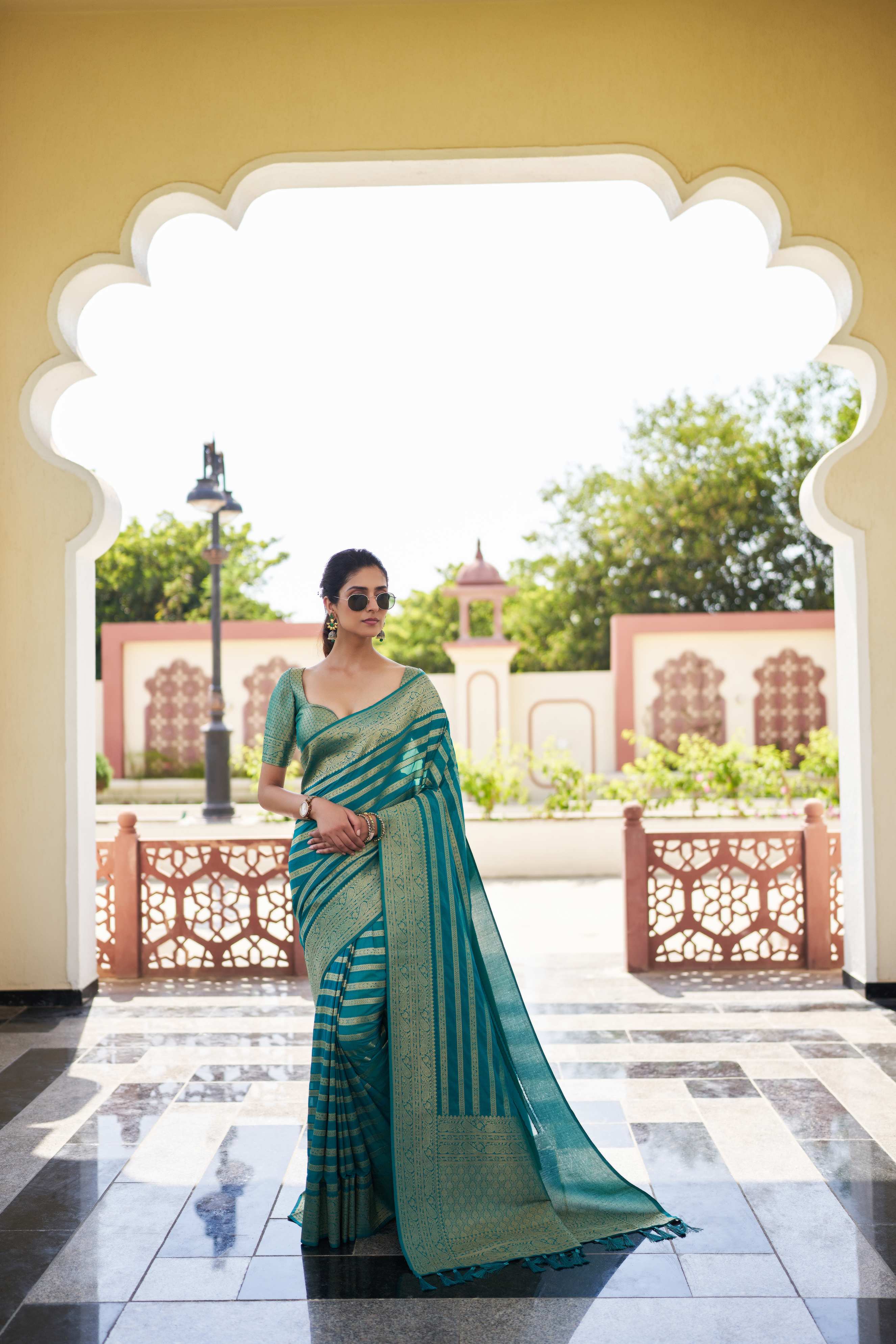 Teal Georgette Zari Striped Saree