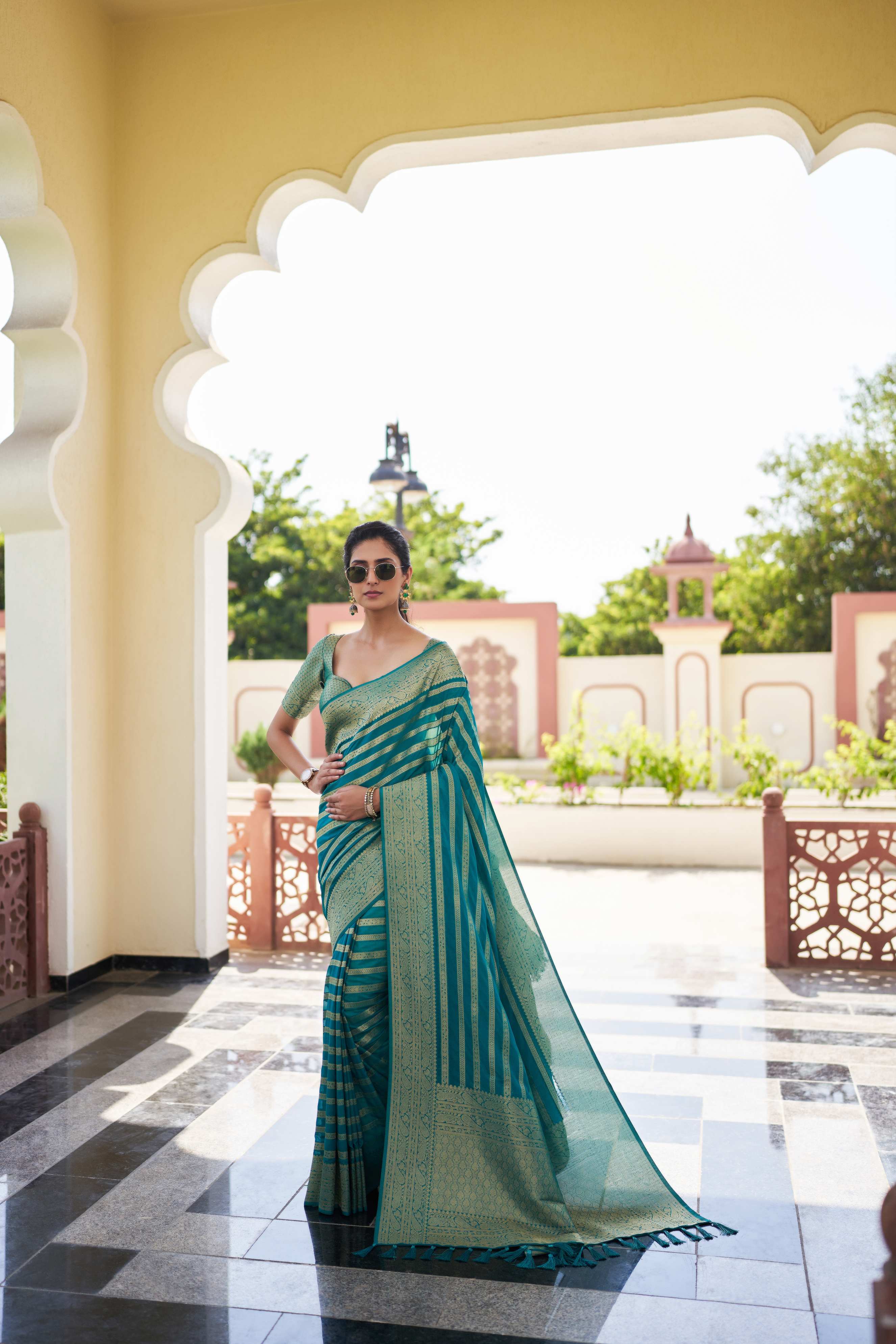 Teal Georgette Zari Striped Saree
