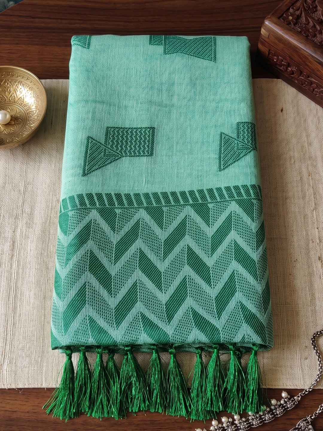 Teal Green Geometric Woven Linen Saree