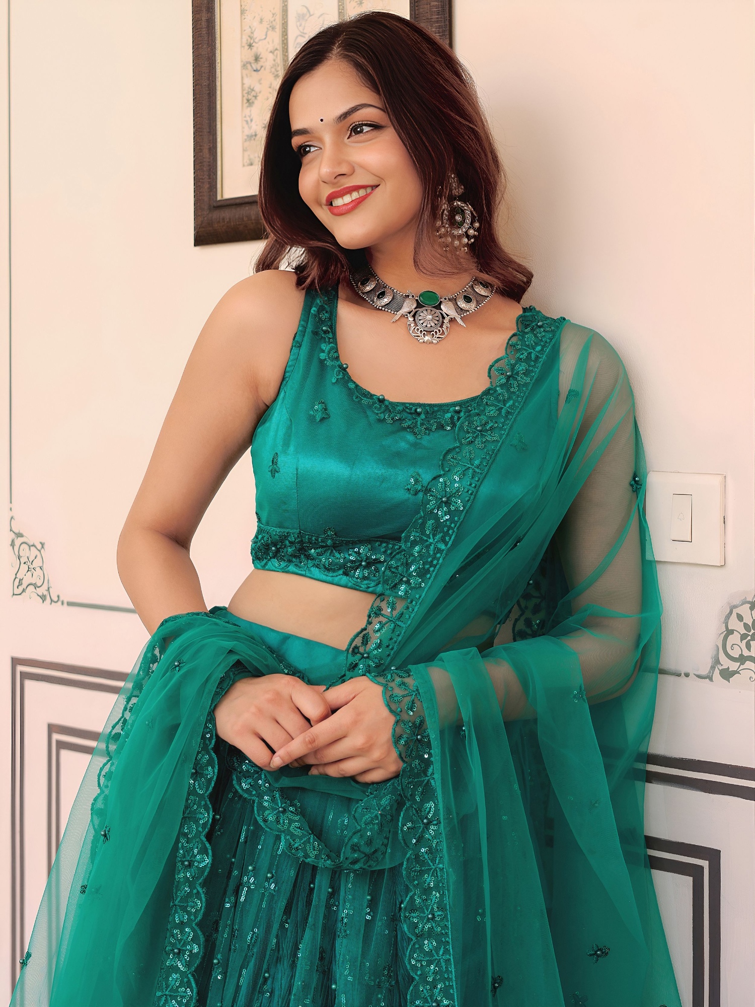 Teal Sequins Embroidered Soft Net Lehenga Choli