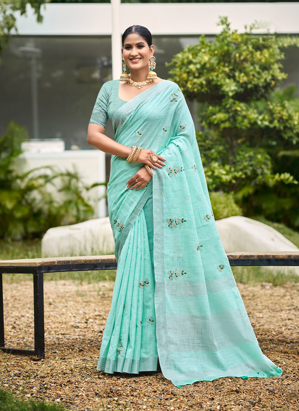 Turquoise Woven Embroidered Linen Saree