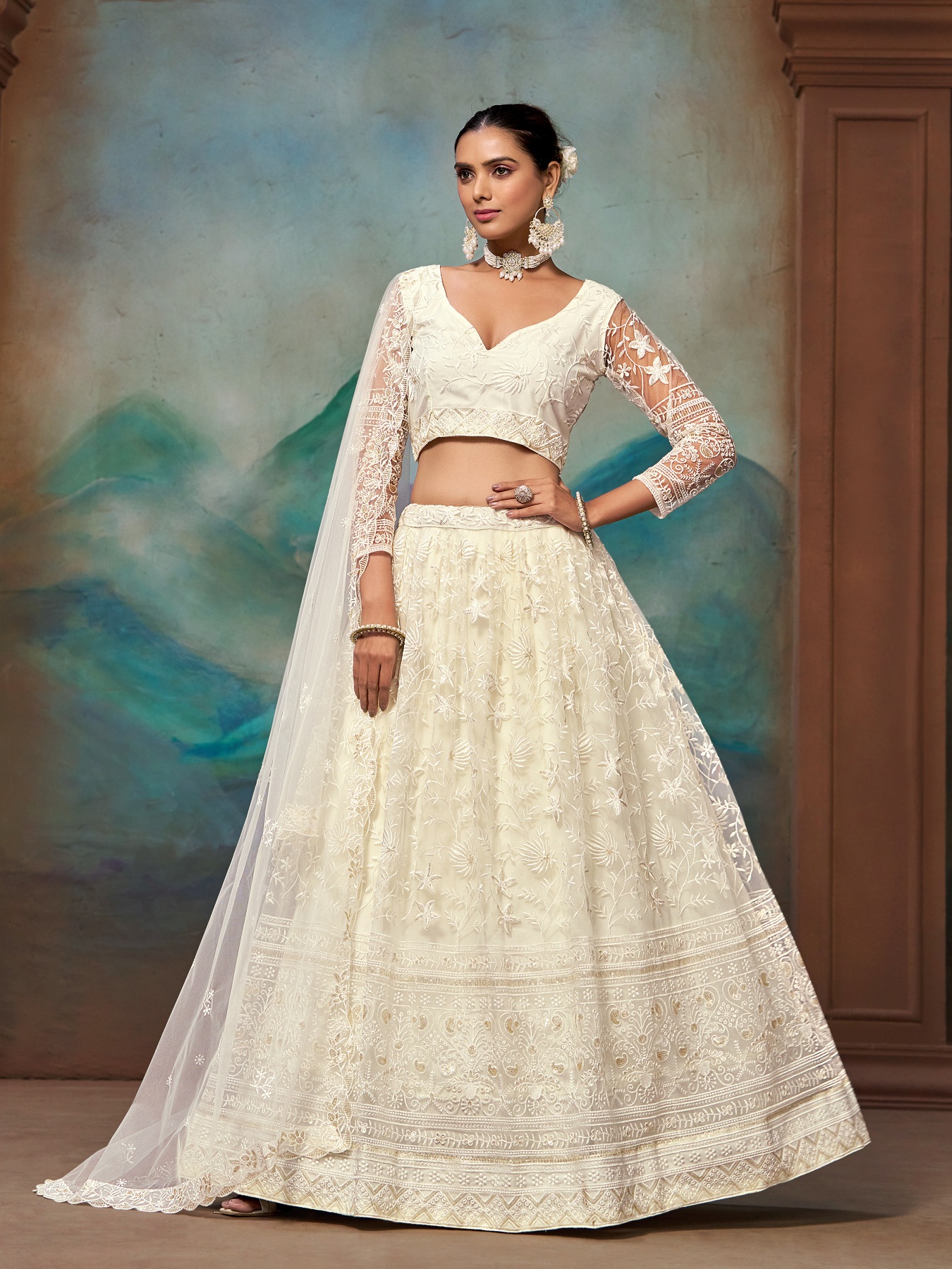 White Zari Embroidered Net Lehenga Choli