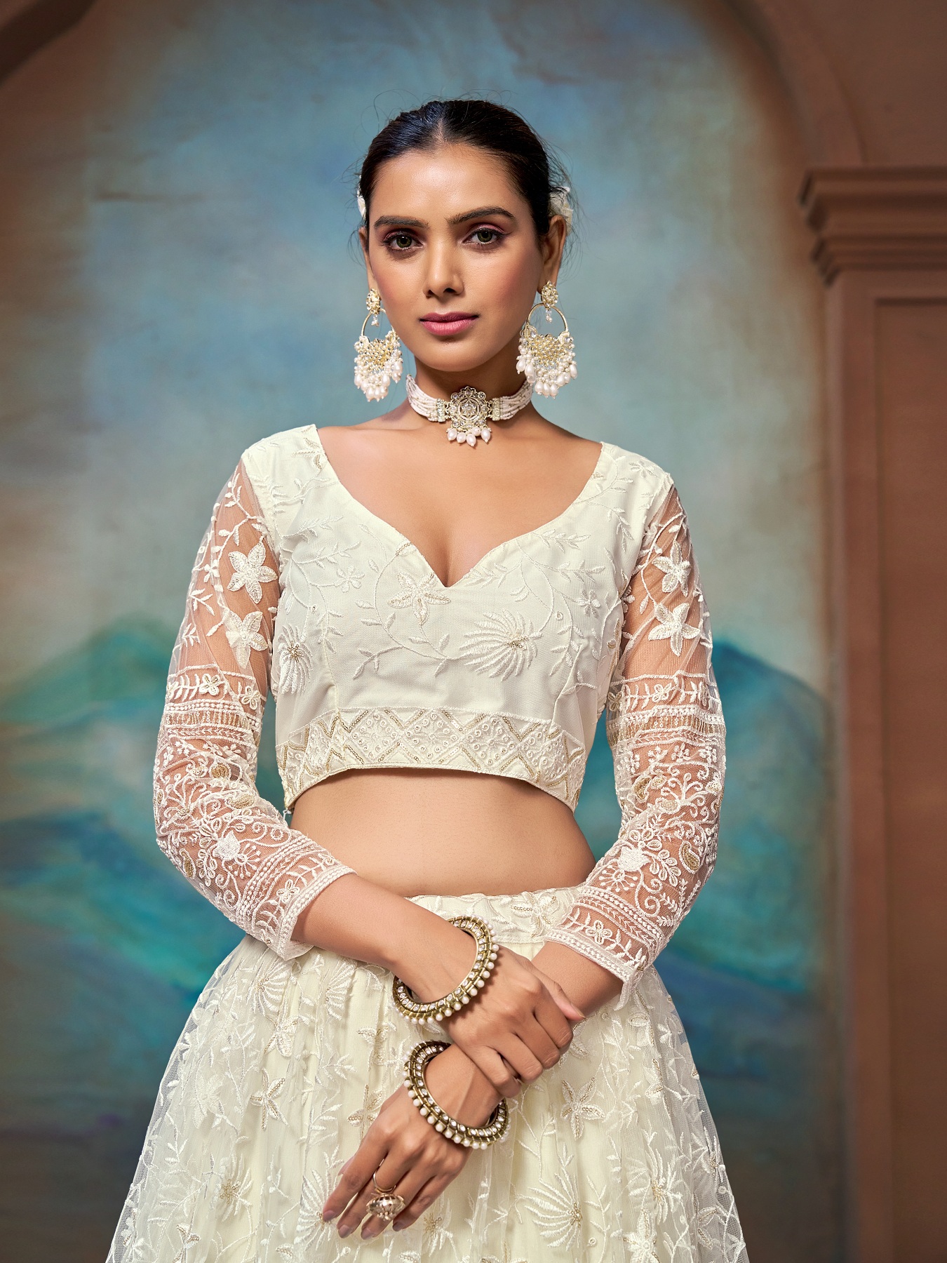White Zari Embroidered Net Lehenga Choli